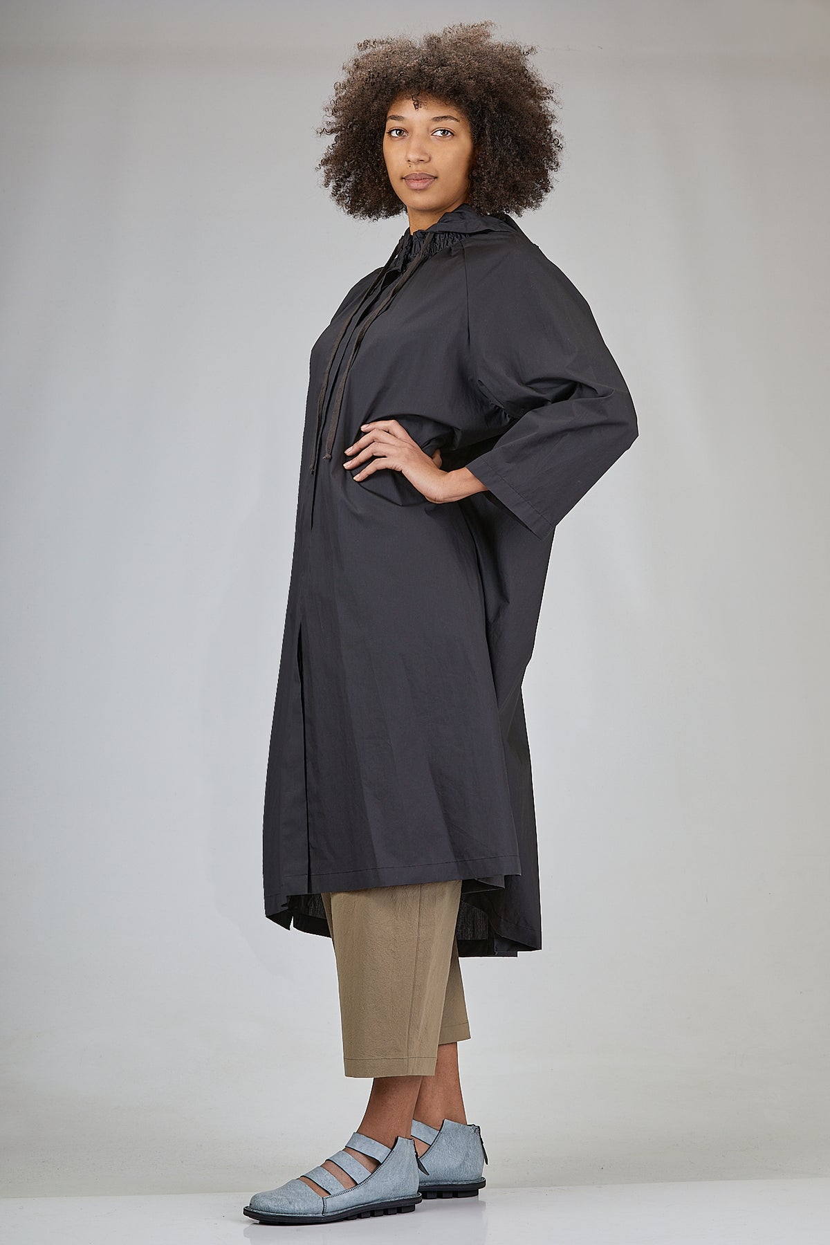 raincoat gathered at the neck with a hood