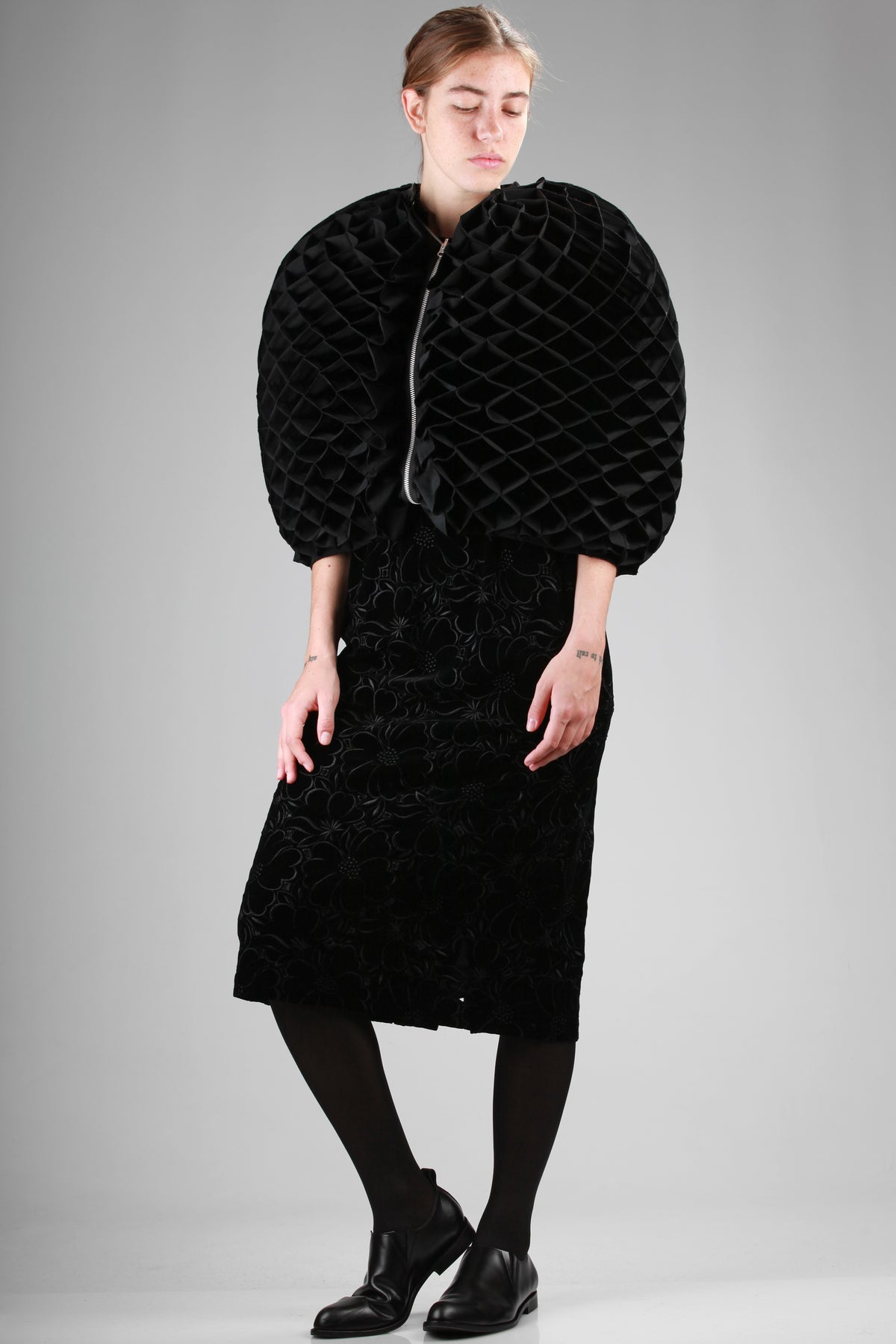 Wide origami-effect cape