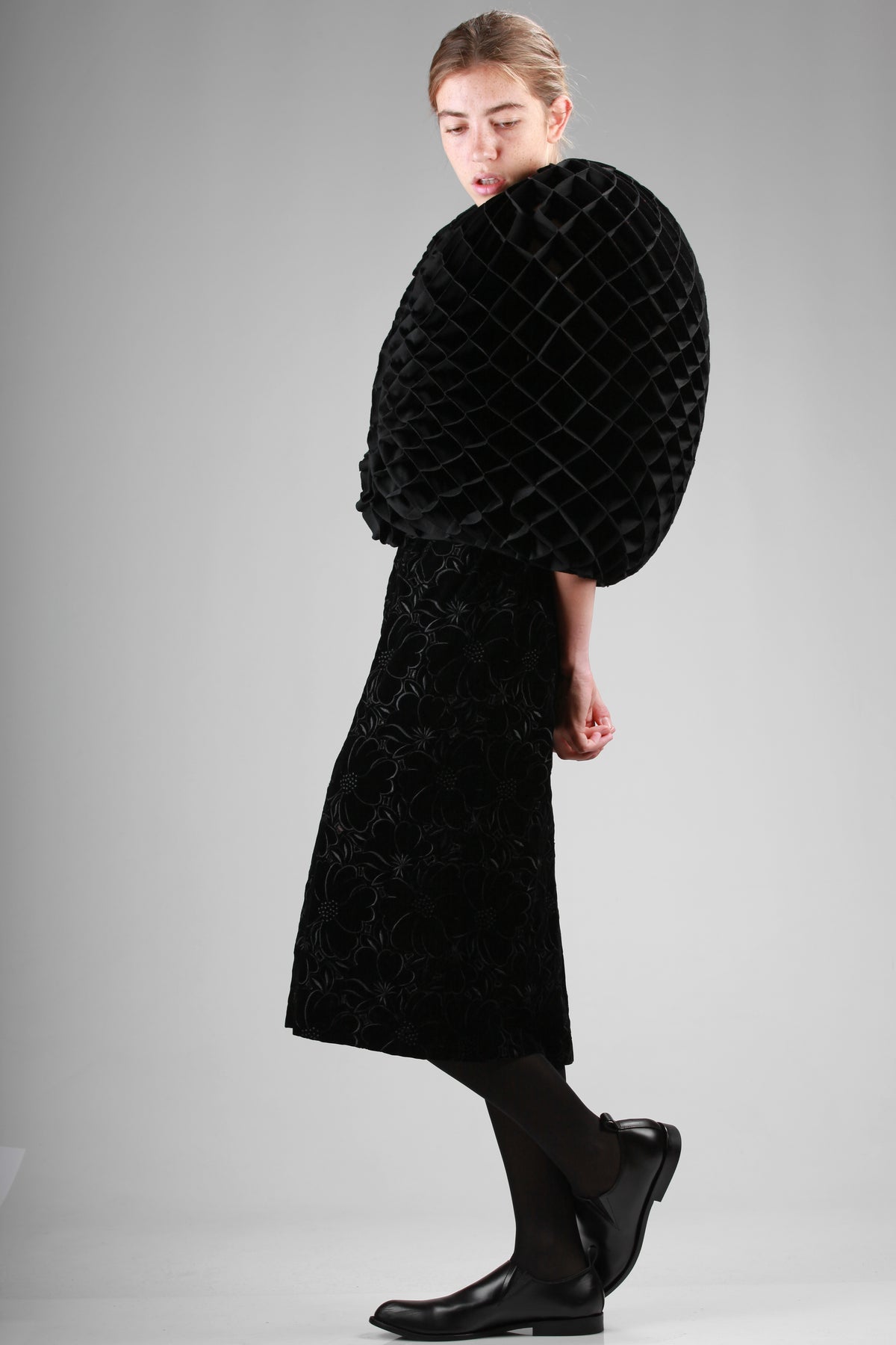 Wide origami-effect cape