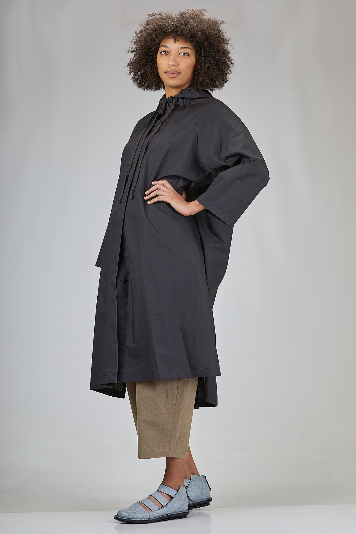 raincoat gathered at the neck with a hood
