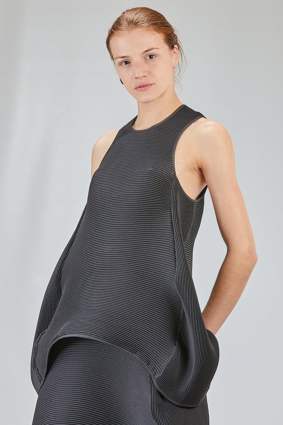 Long, flared polyester pleated 'sculpture' top