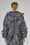 impermeabile 'sculpture' sotto al ginocchio, ampio, in tela tecnica di nylon e parti in maglia di lana - JUNYA WATANABE 